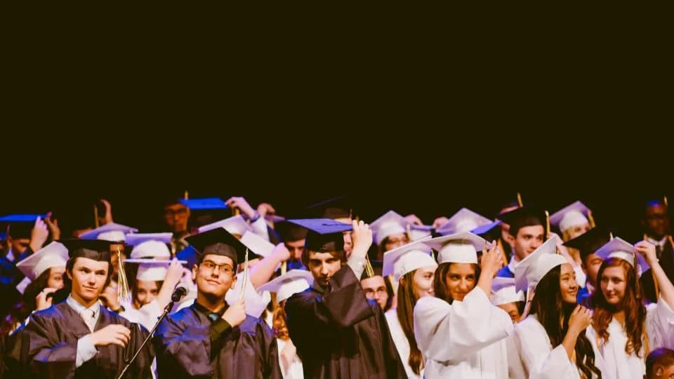 Graduating students in caps and gowns