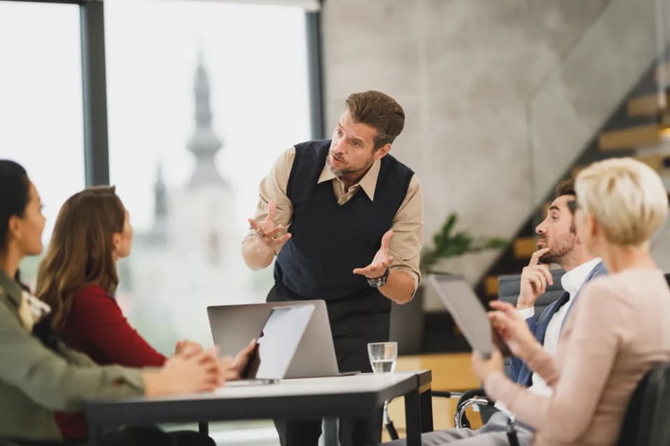 A presenter leading a business session