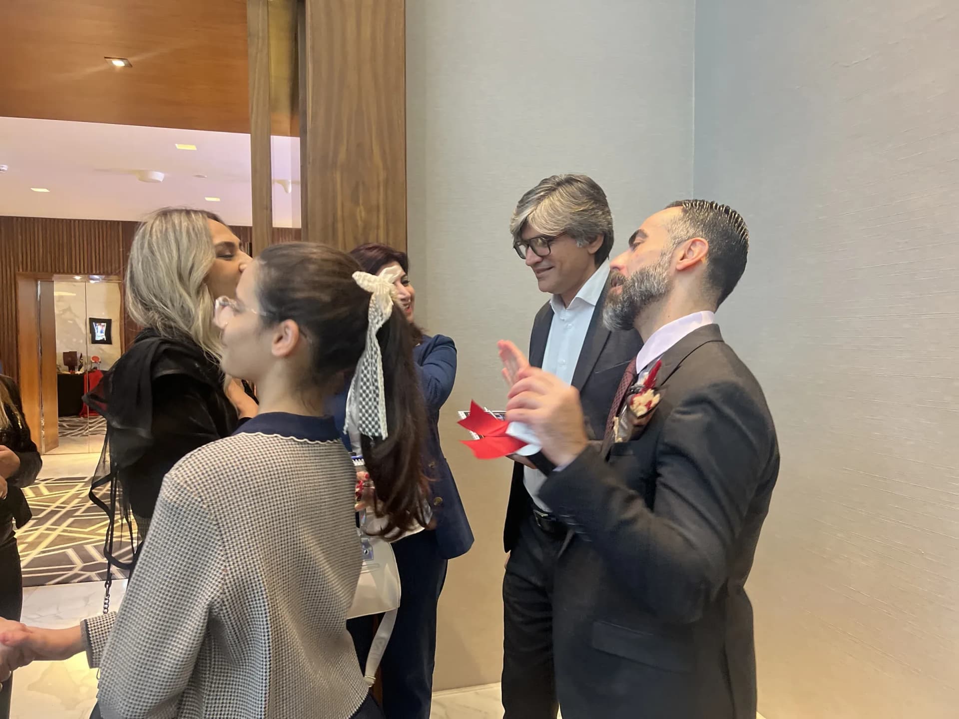 Delegates in conversation at an NLA event