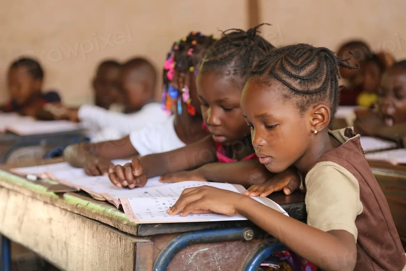 Children reading together in a classroom